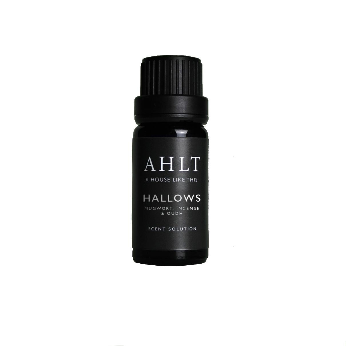 10ml black glass bottle of HALLOWS fragrance oil by A House Like This, shown with product label, used for diffusers and aromatherapy